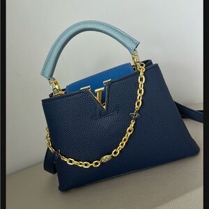 Elegant Blue Handbag with Gold Chain